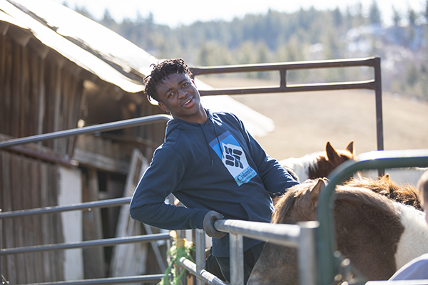 student volunteers at orphan acres