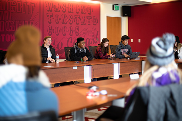 students participate in meeting